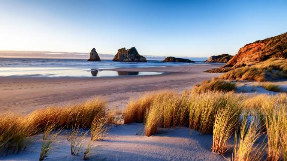 Landscape image of sunset at coastline in New Zealand